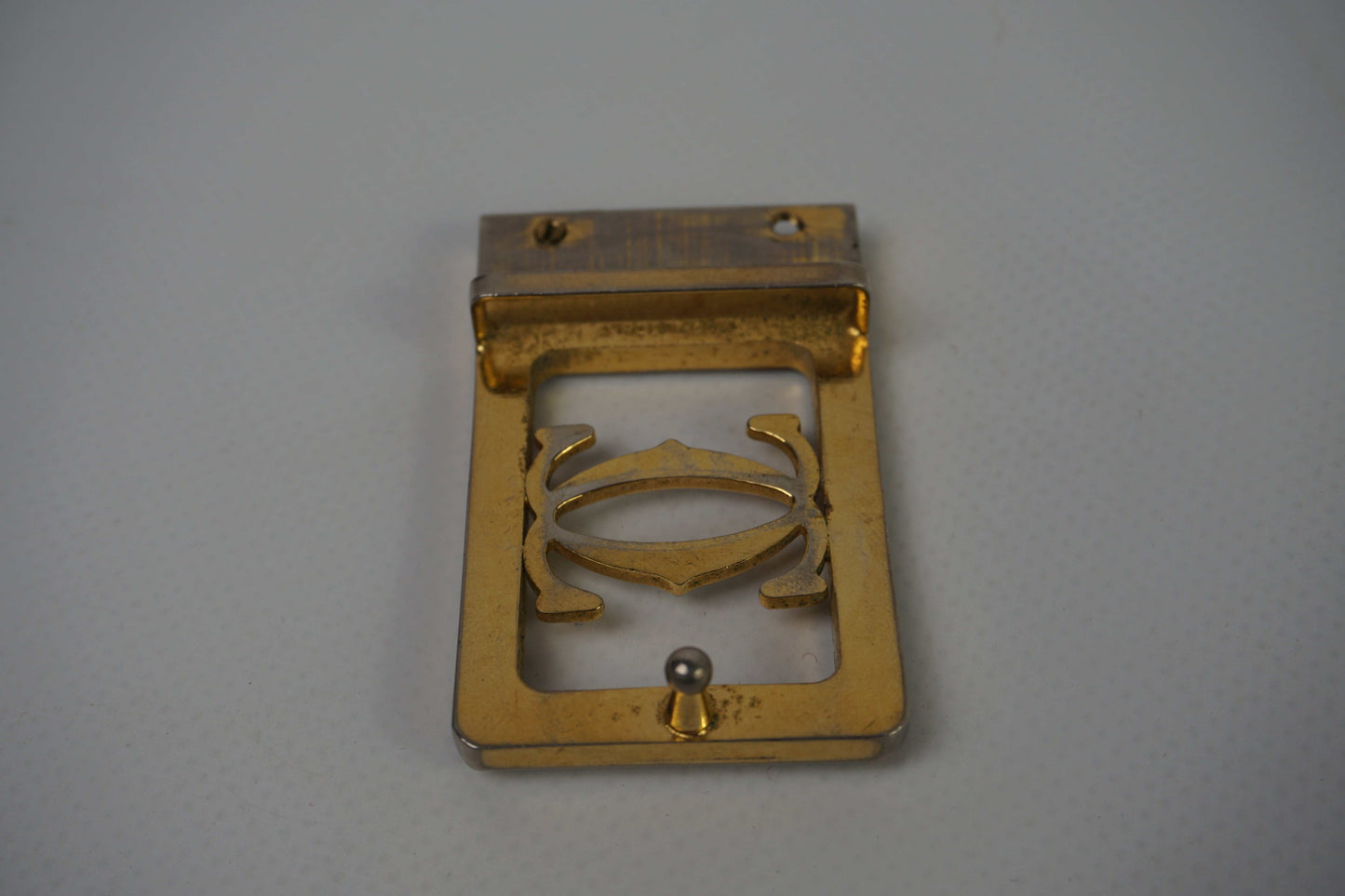 Gold and silver Cartier belt buckle in 7/10 condition.