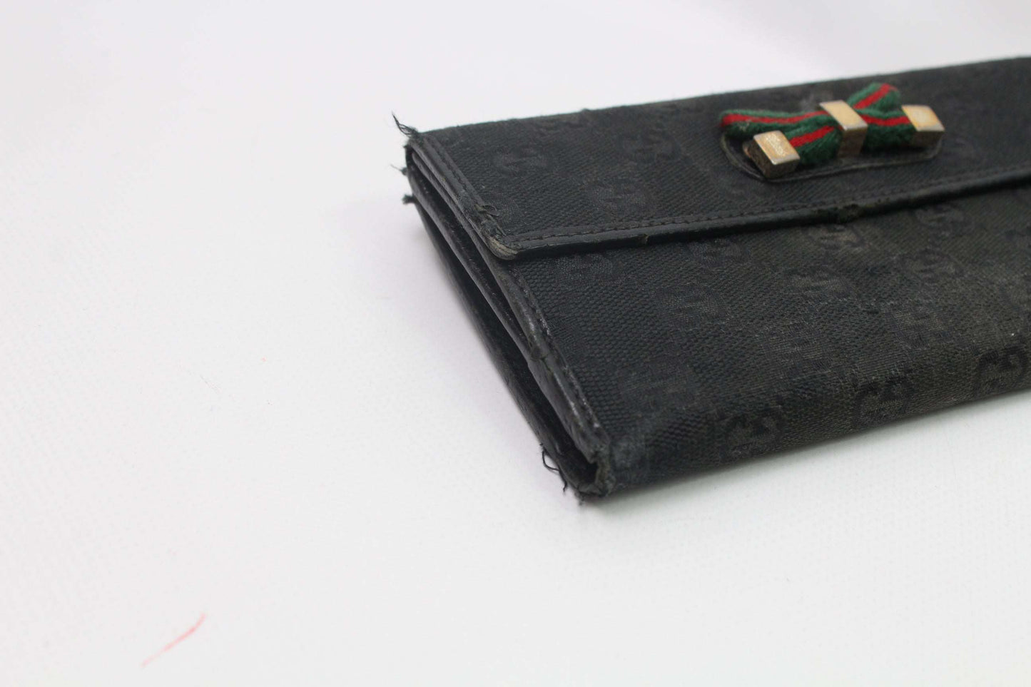 GUCCI Longwallet in black monogram design, size 21x10cm, cotton material, condition 7/10.