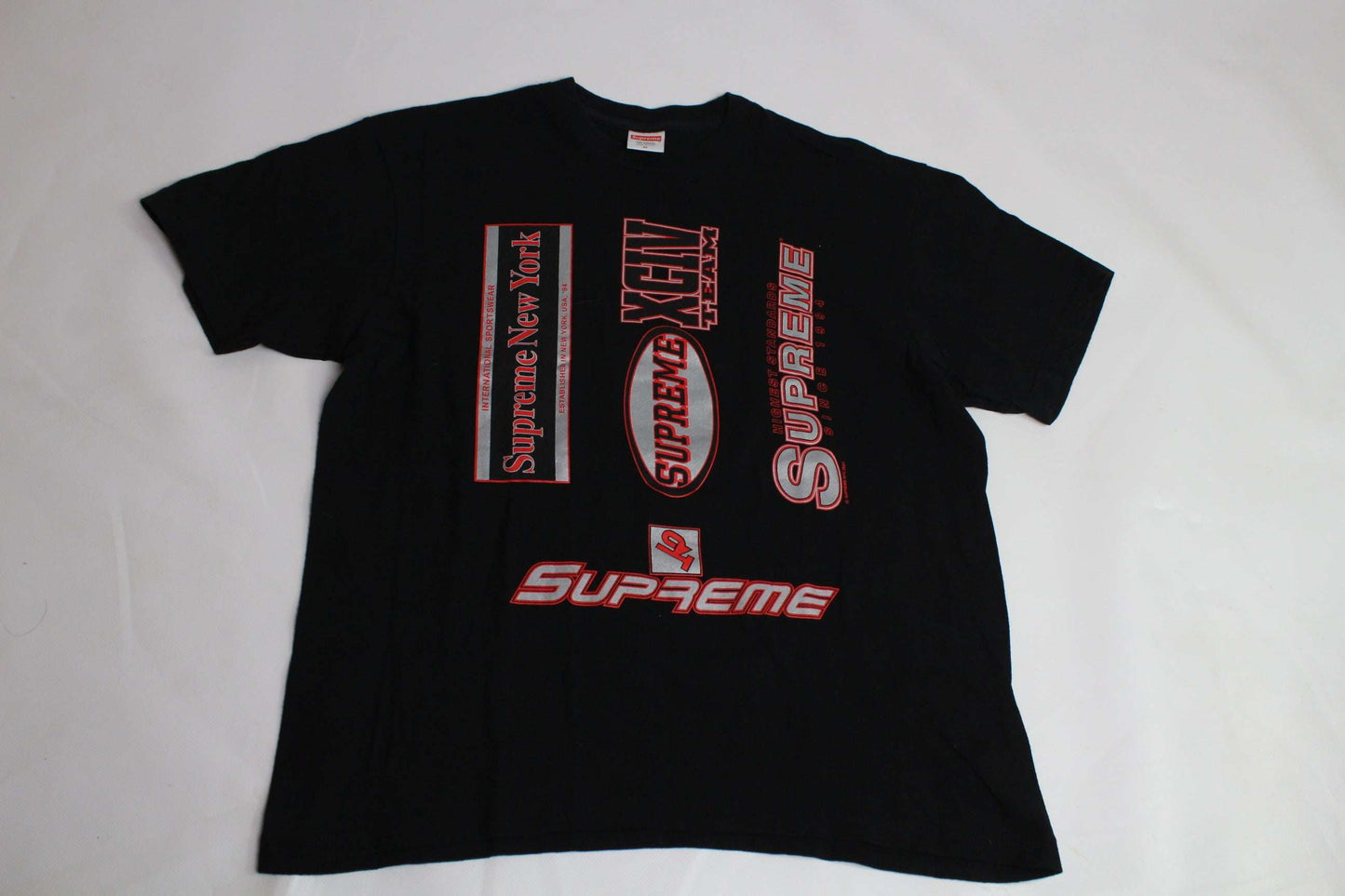 SUPREME 21FW Multi Logo T-shirt in black with colorful logos, size M, 100% cotton, condition 8/10.