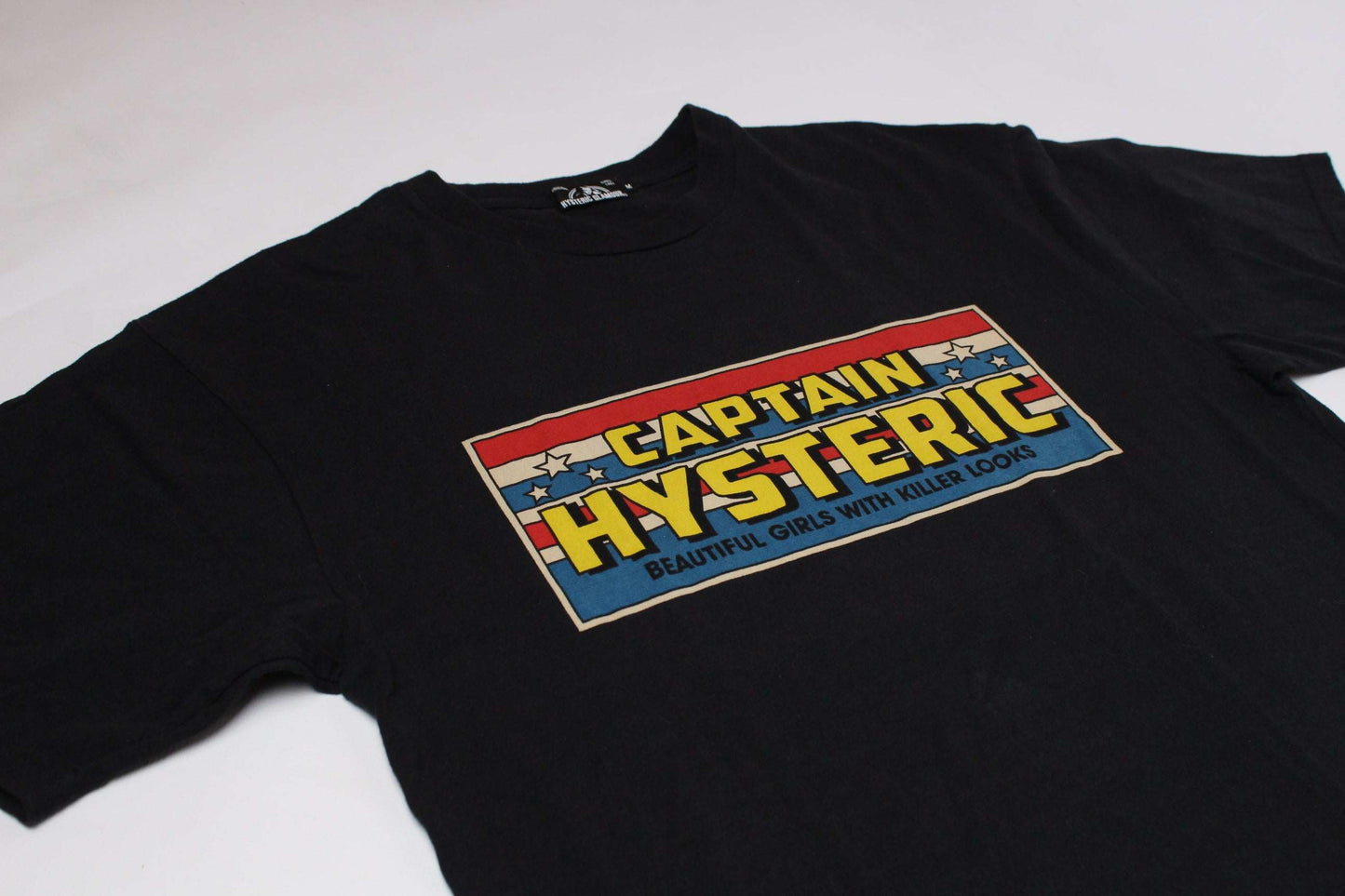 HYSTERIC GLAMOUR „Captain Hysteric“ black T-shirt with colorful bold graphic on front.