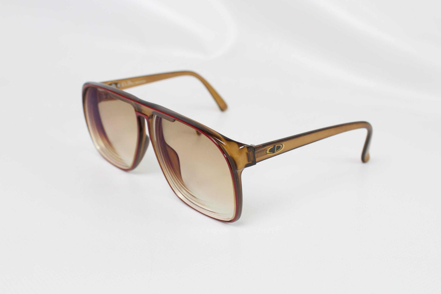DIOR Shades (Stärke) with brown tint and plastic frame.