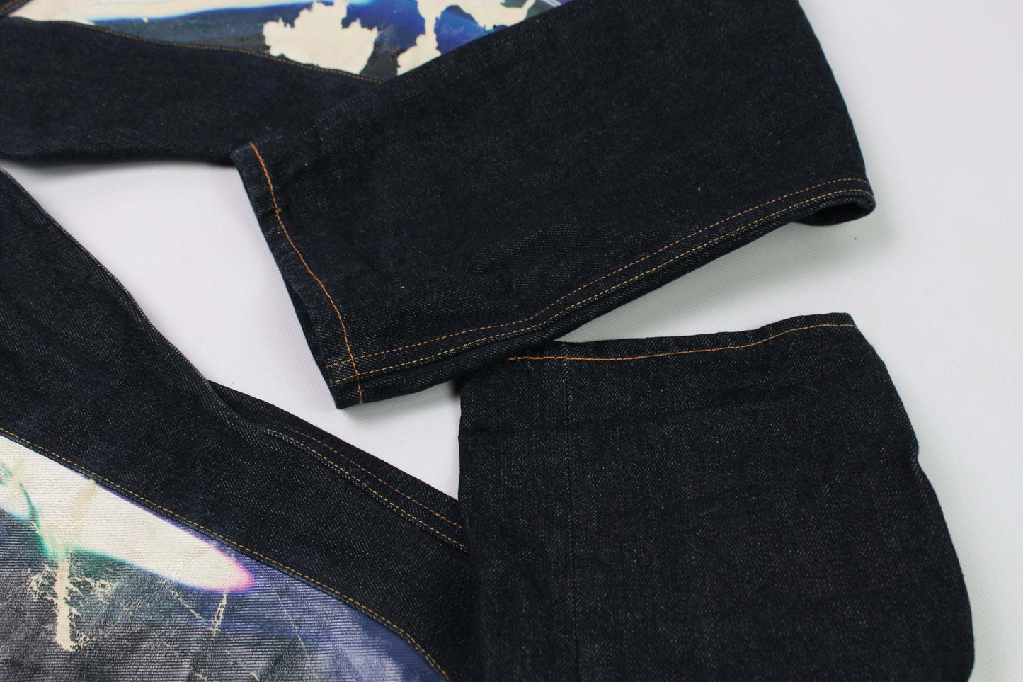 EVISU Blue Daicock Denim Selvedge jeans, size 32, baggy fit, dark blue cotton fabric, visible discoloration.