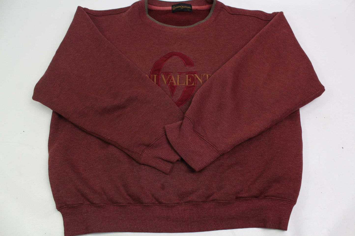 VALENTINO red sweater, size M, with light wear.