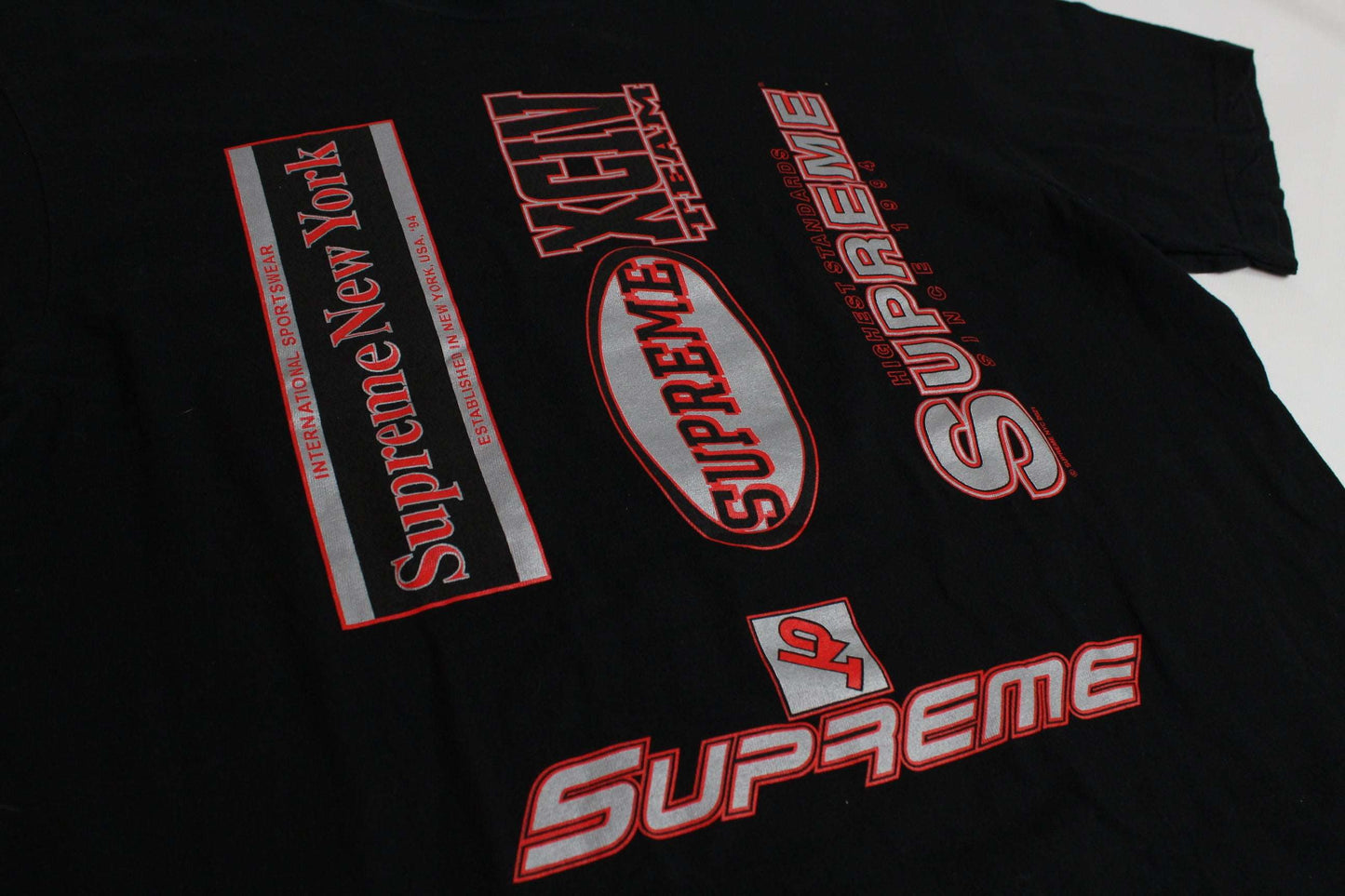 SUPREME 21FW Multi Logo T-shirt in black with colorful logos, size M, medium-large fit, 100% cotton.