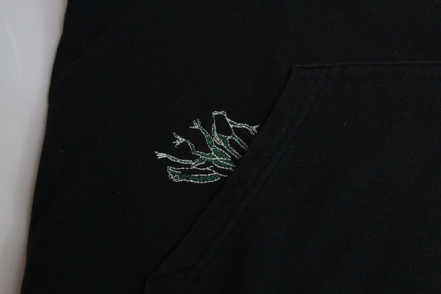 LEFT ALONE Hoodie Black, medium size, cotton, black with colorful design, condition 8/10.