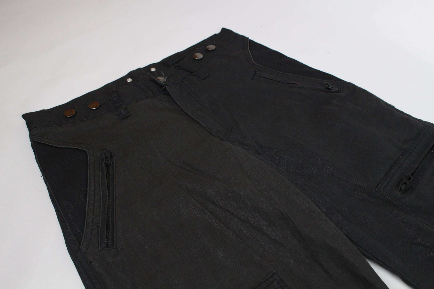 Black Fuga Pants, size 32, baggy fit, waxed cotton.