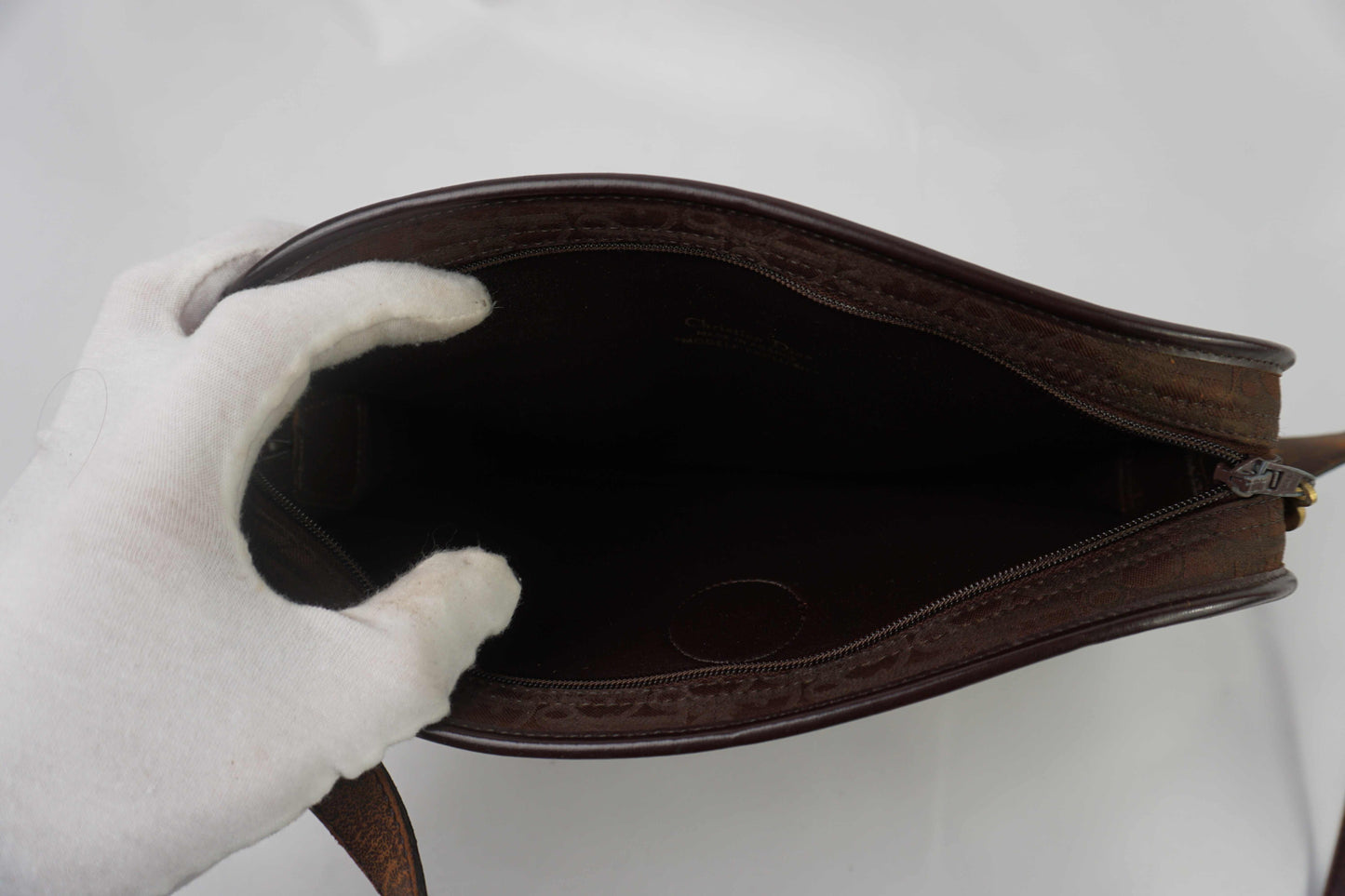 DIOR Vintage Sidebag in brown canvas with monogram design, inside view.