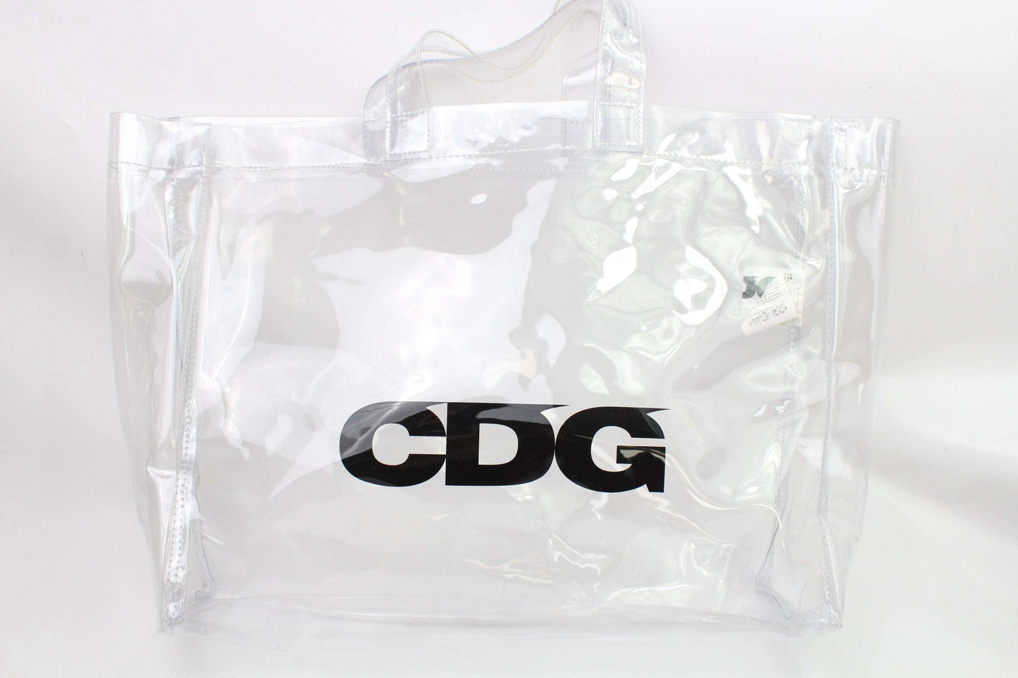 COMME DES GARCONS clear shopper bag with CDG logo, plastic material, 9/10 condition.