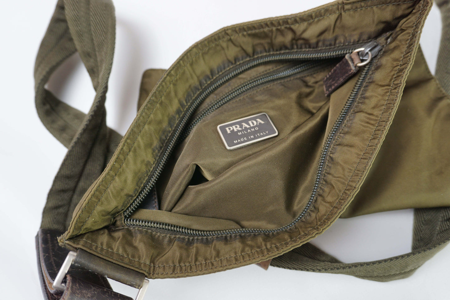 PRADA Slingbag Brown, nylon material, 20x20 cm, visible flaws, 8/10 condition.