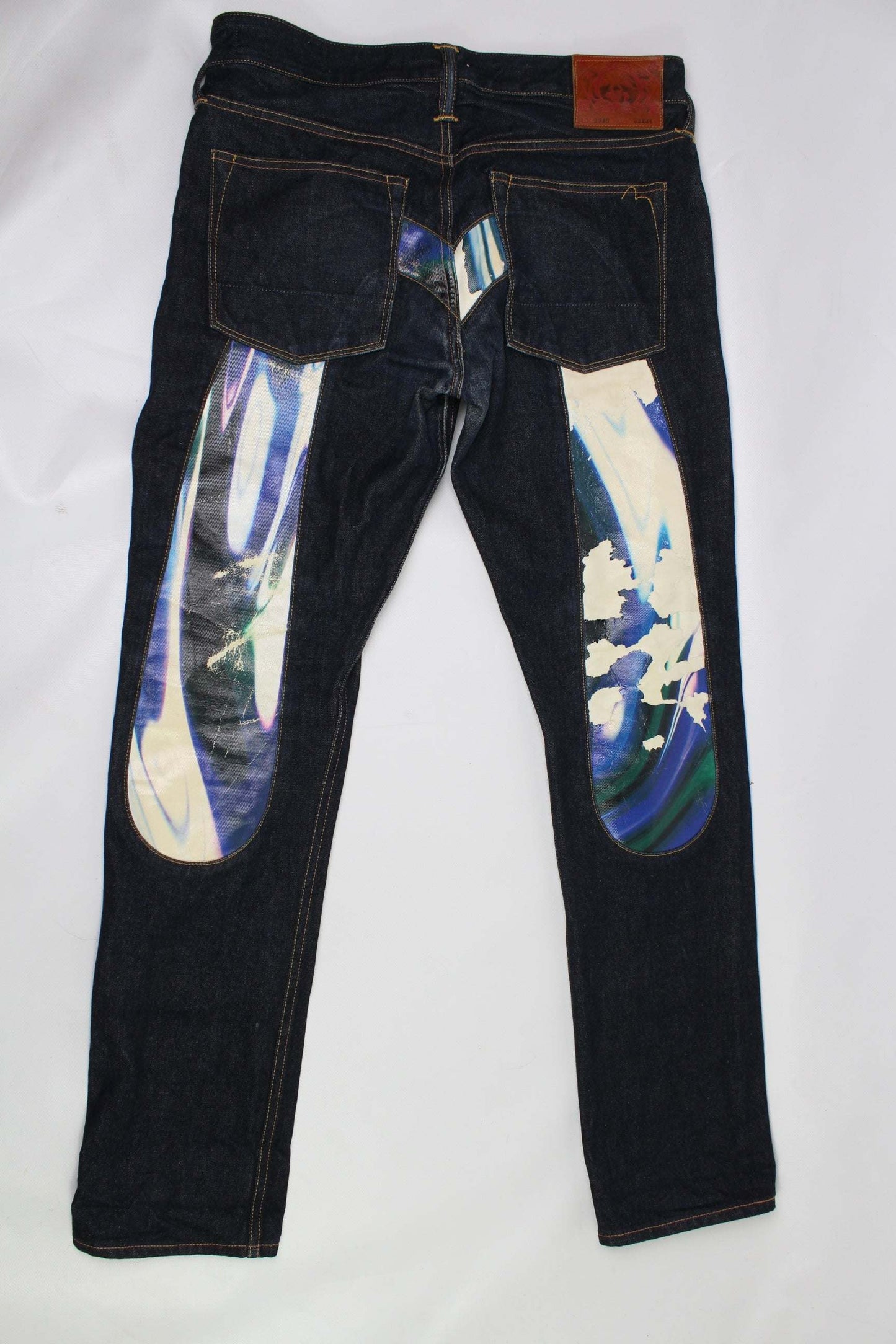 EVISU Blue Daicock Denim Selvedge jeans in dark blue color, size 32, baggy fit, featuring unique back design, made in Japan.