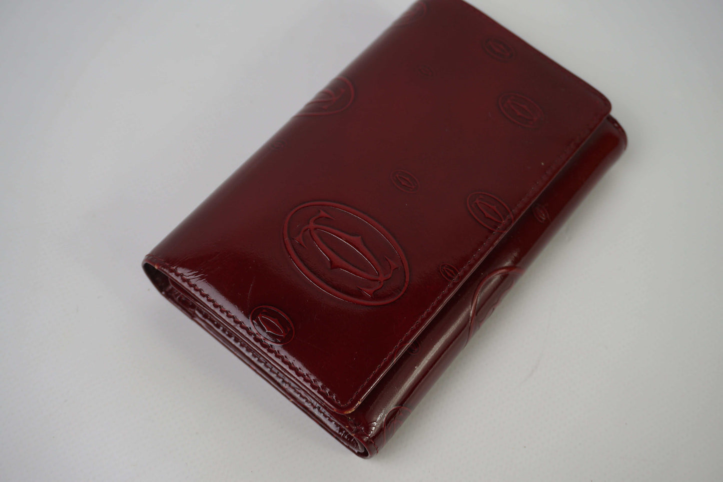 CARTIER Leather Longwallet Bordeaux, red leather, embossed logo, 18x13cm.