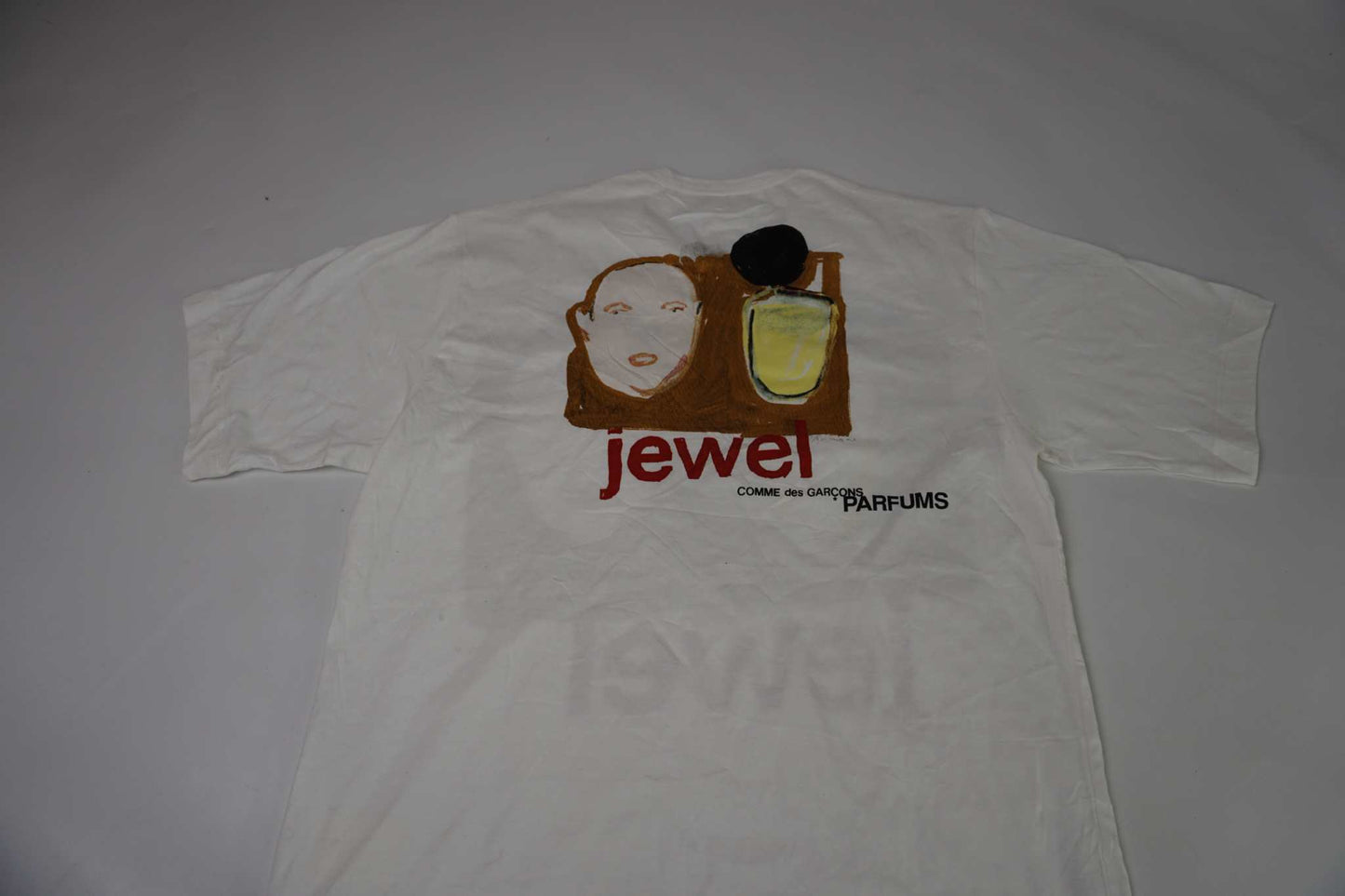 COMME DES GARÇONS Shirt "jewel" size S with graphic design, condition 8/10.