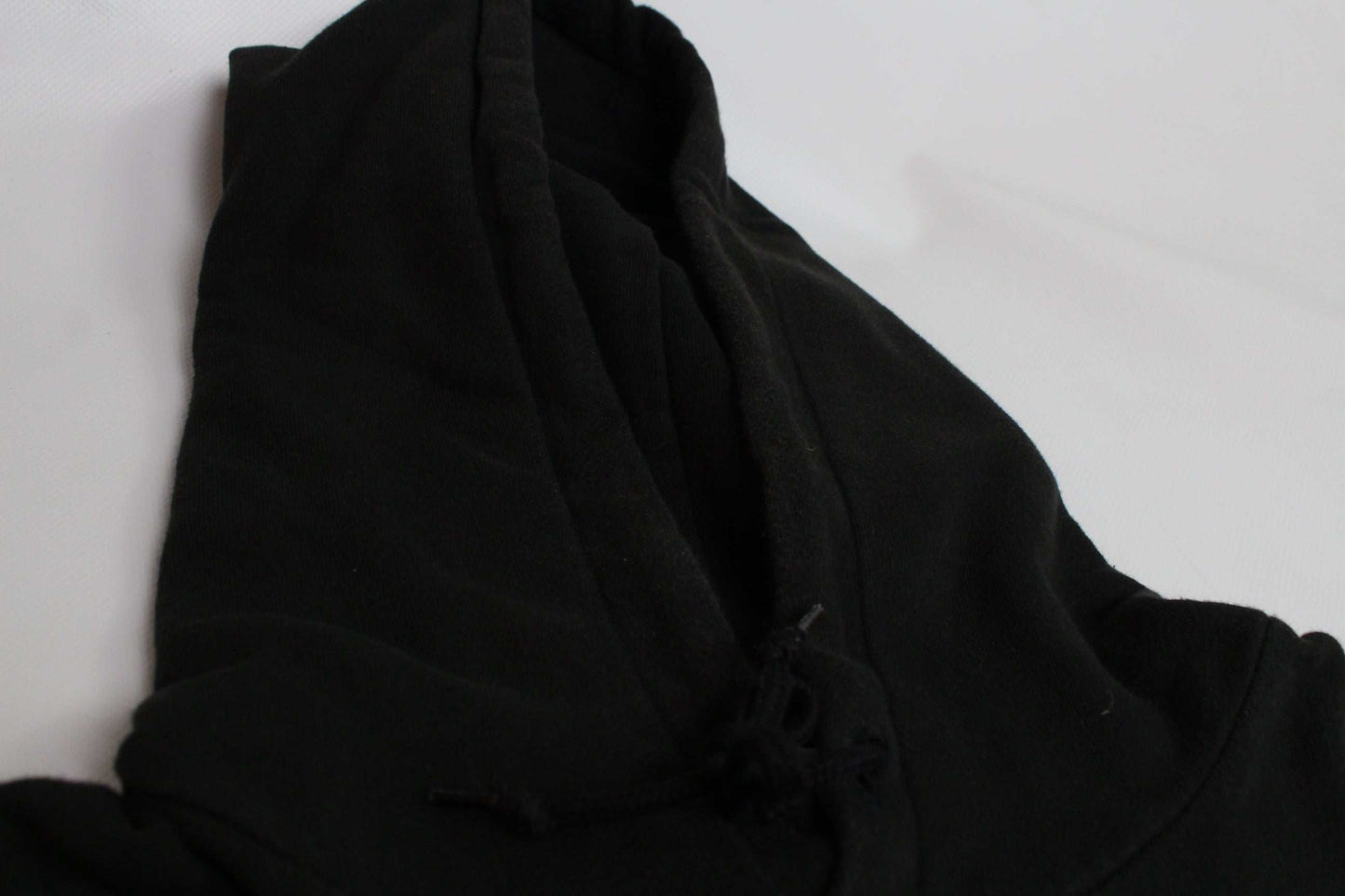 Black LEFT ALONE hoodie made of 100% cotton, size M, with minimal wear.