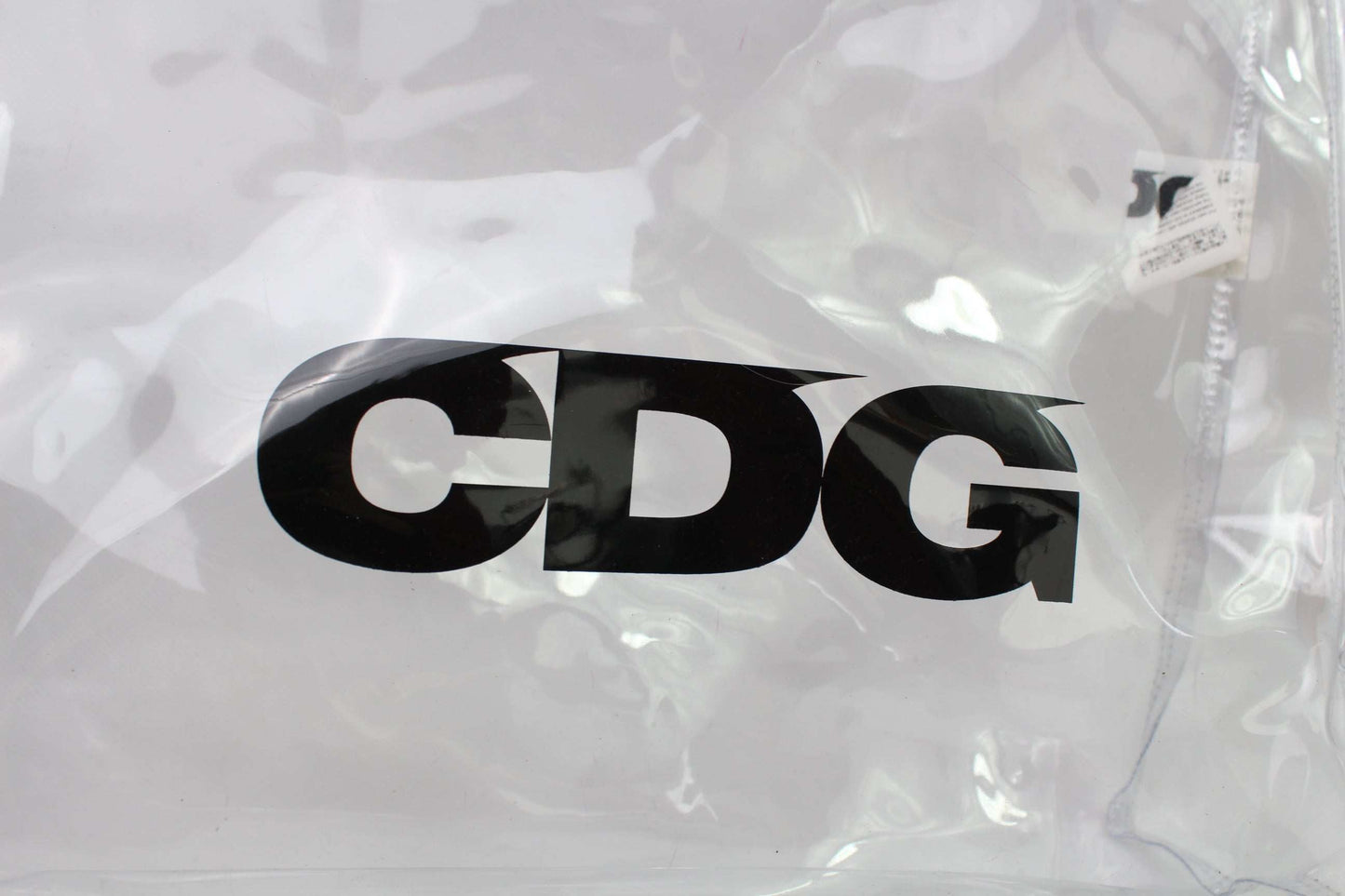 Clear COMME DES GARCONS Shopper Bag with CDG logo, plastic material, slight signs of use, condition 9/10.