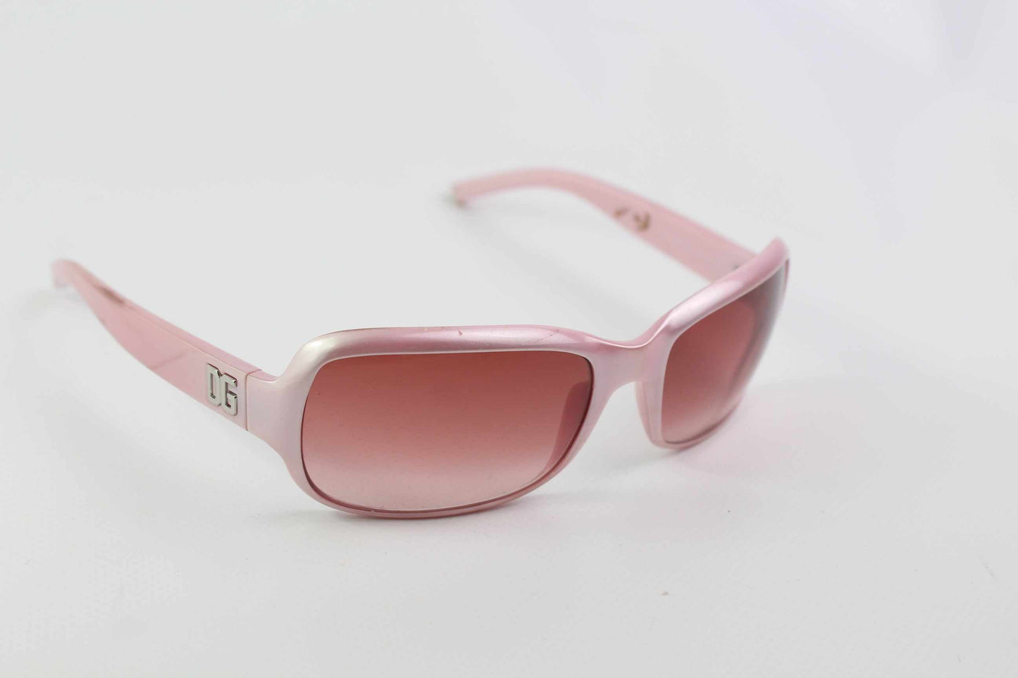 Dolce Gabbana pink sunglasses with reddish tint, onesize.
