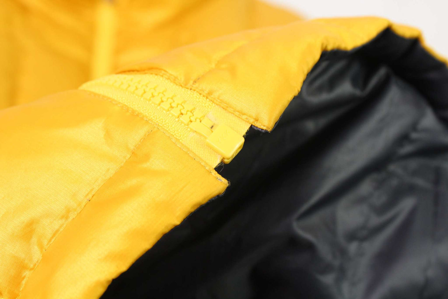 Yellow and black Burberry's Reverse Jacket made of polyester.