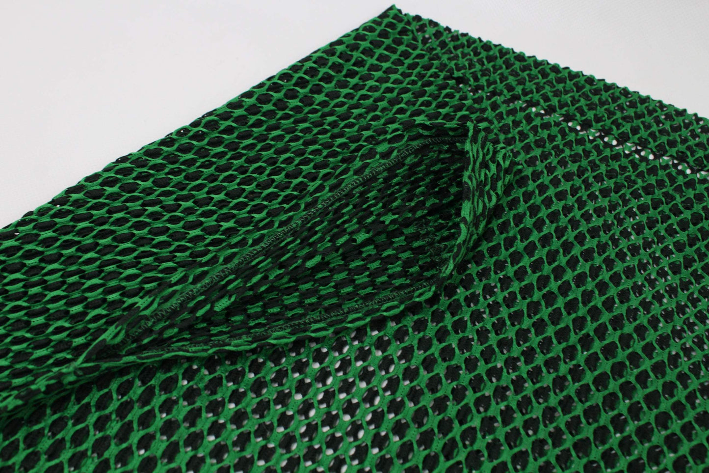 ISSEY MYIAKE green T-shirt, size M, mesh detail.