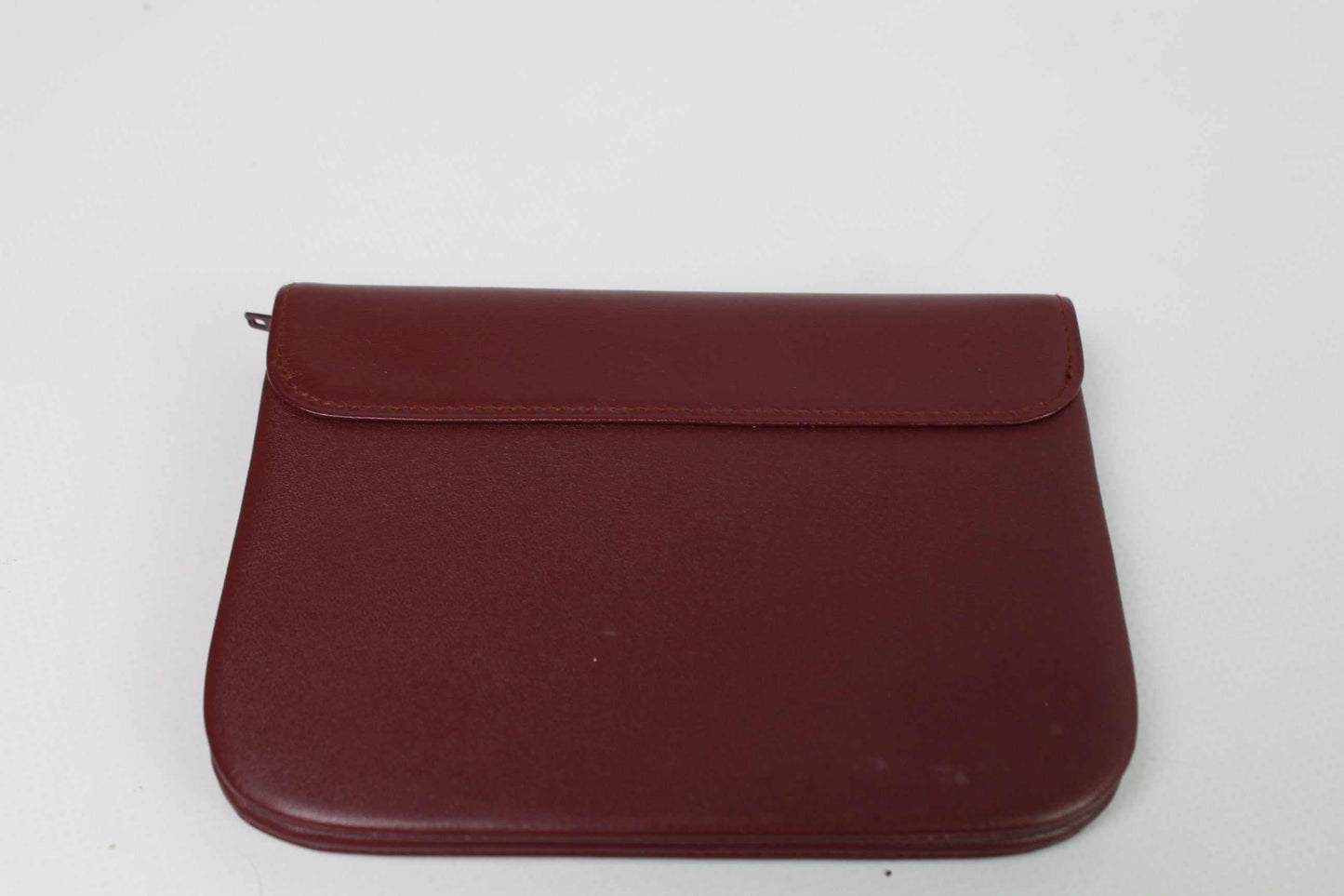CARTIER Leather Longwallet Bordeaux, red leather, 15x10 cm, condition 9/10.