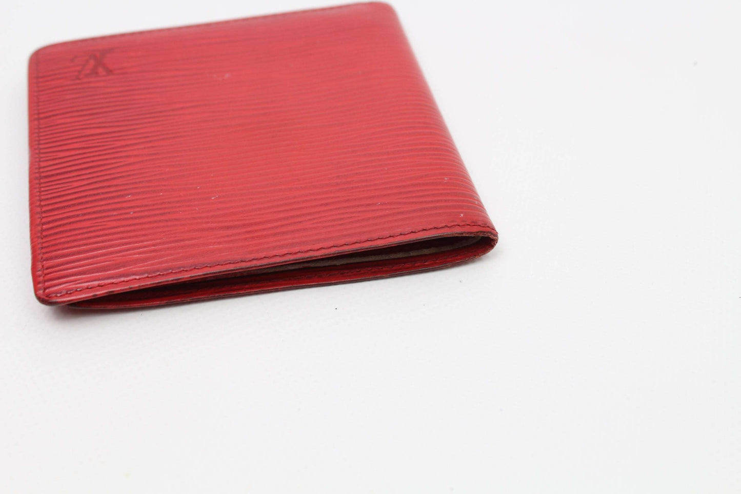 LOUIS VUITTON Epi Portemonnaie Red leather wallet, 10x10cm, in good condition.