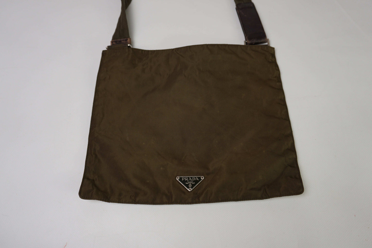 Brown PRADA Slingbag, nylon material, size 20x20 cm, condition 8/10.