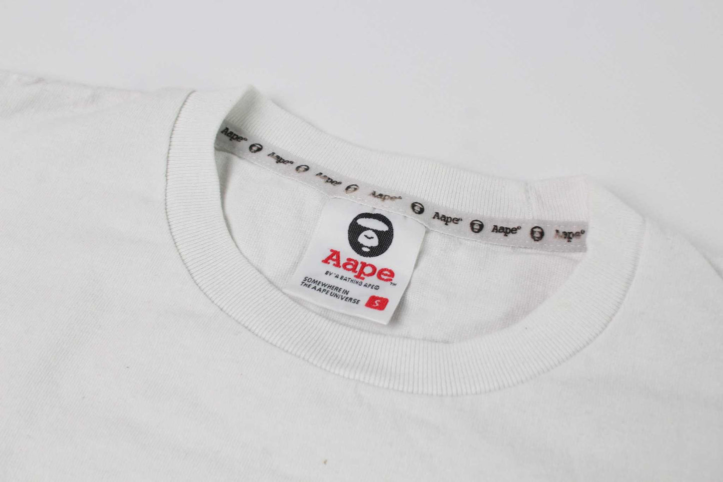 BAPE AAPE Laser Foil Camo Stencil Face TeeBAPE AAPE Laser Foil Camo Stencil Face Tee | LAYZSSHOP | Bape