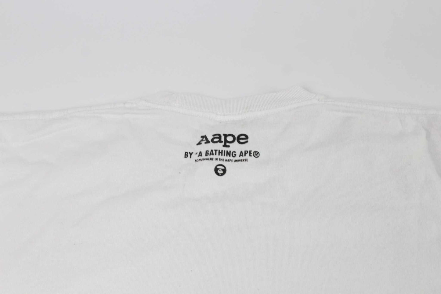 BAPE AAPE Laser Foil Camo Stencil Face TeeBAPE AAPE Laser Foil Camo Stencil Face Tee | LAYZSSHOP | Bape