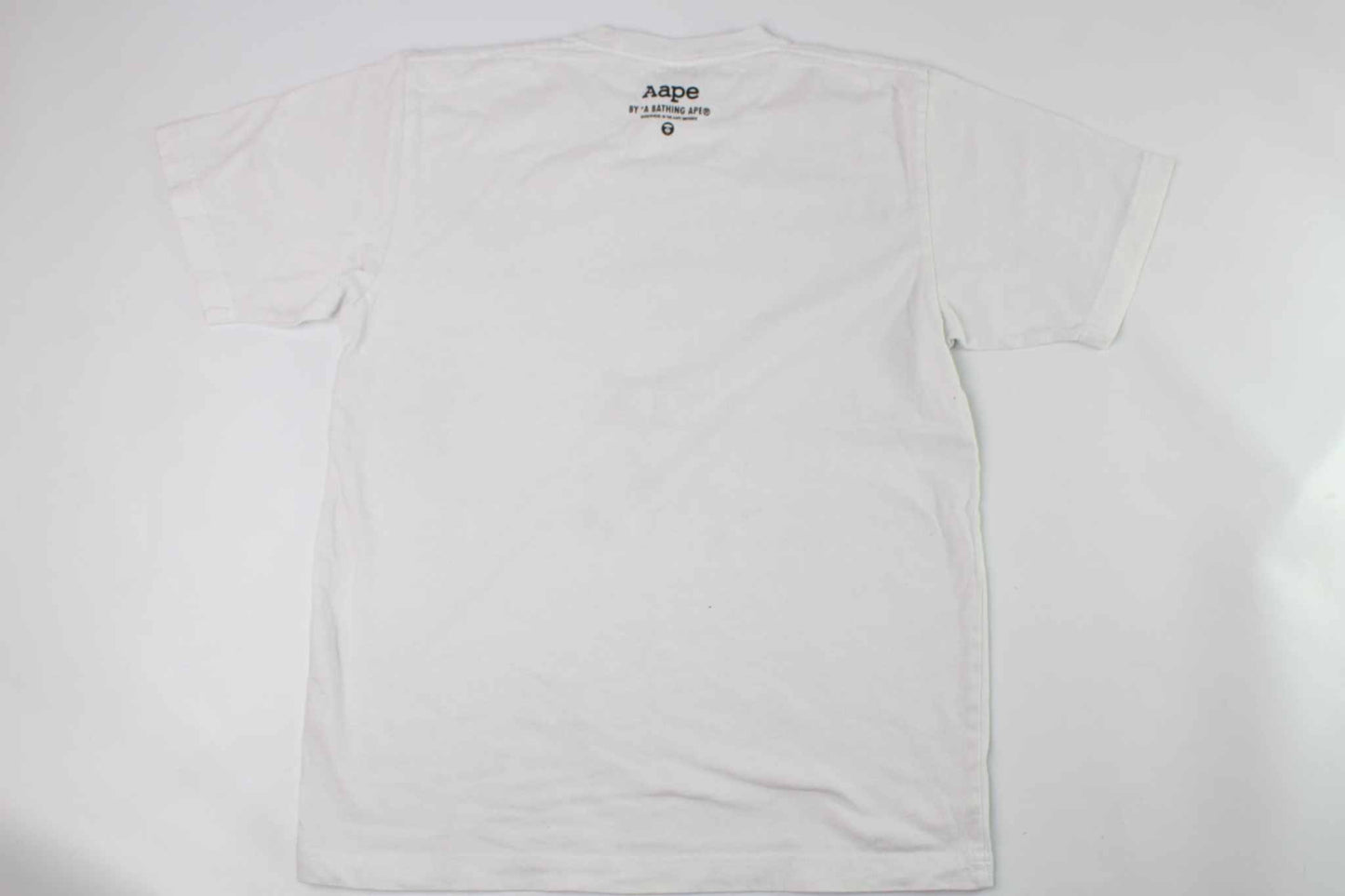 BAPE AAPE Laser Foil Camo Stencil Face TeeBAPE AAPE Laser Foil Camo Stencil Face Tee | LAYZSSHOP | Bape