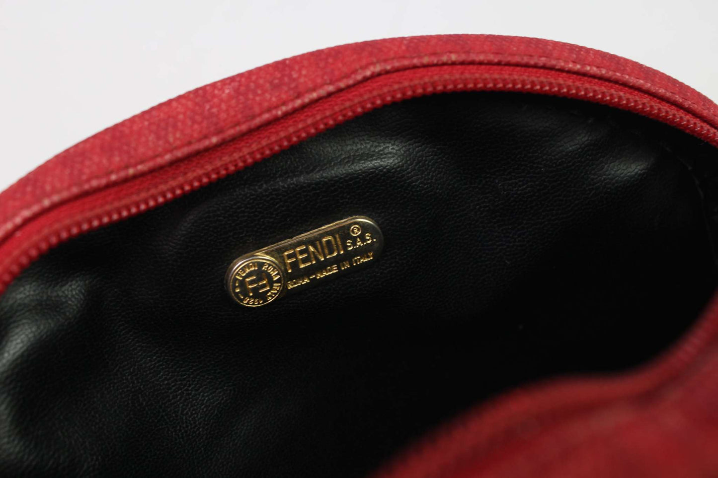 Fendi Monogram Bag in red canvas with zip, interior view showing label.