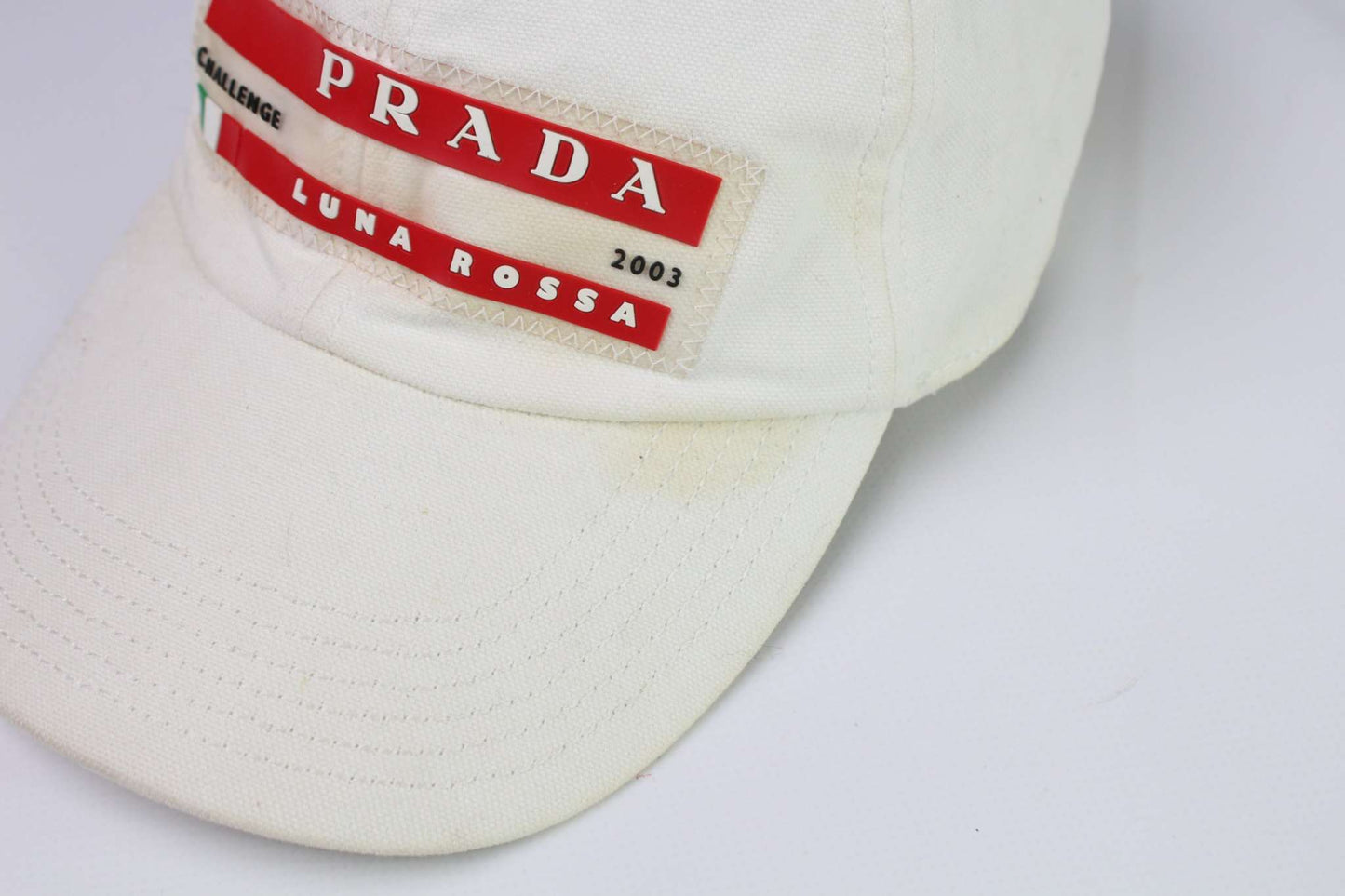 PRADA Luna Rossa Cap White with red logo, onesize, condition 7/10, white and red color.