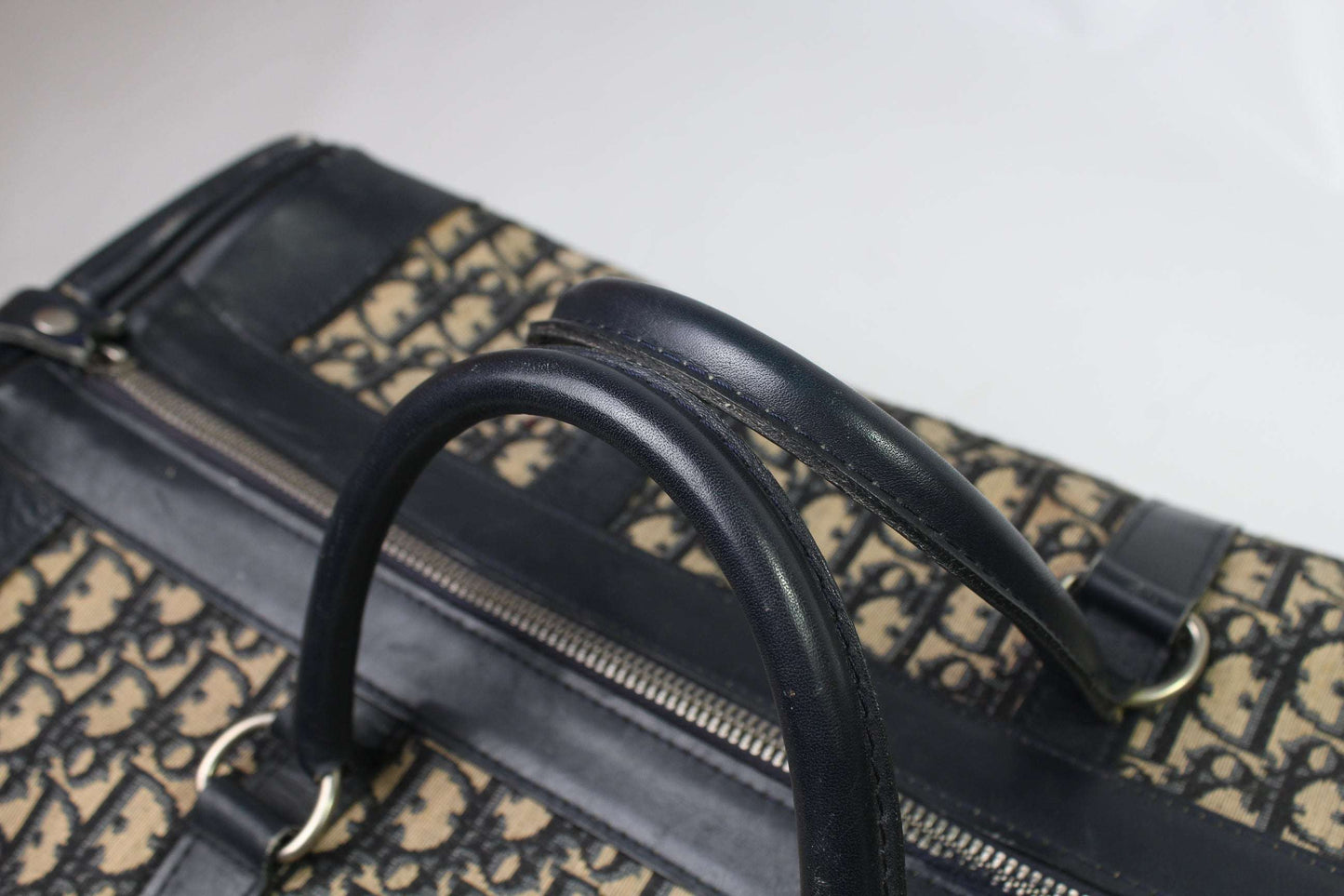 DIOR Keepall Monogram bag, black canvas and leather, 50cm, monogram pattern, slight zipper tear.