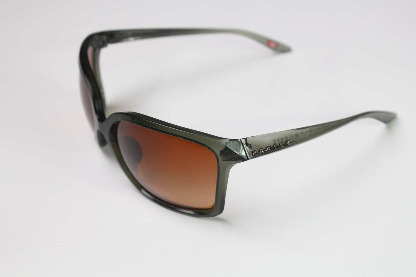 Green Oakley shades with brown lenses, onesize, 8-9/10 condition.