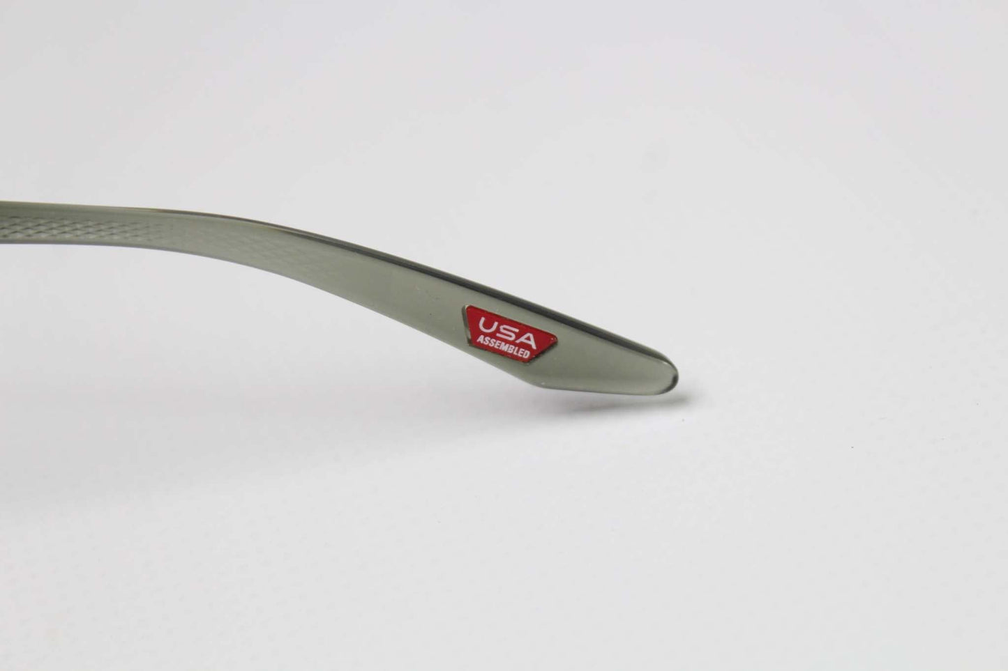 OAKLEY Shades Green sunglasses arm with "USA Assembled" label.