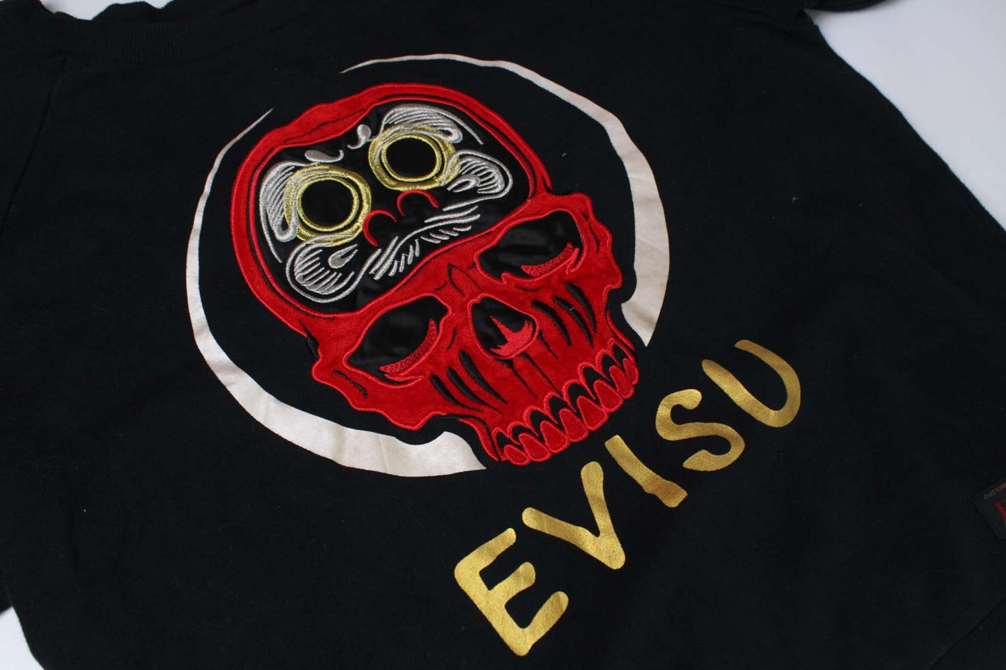 EVISU Crewneck Sweater Black with embroidered skull design.