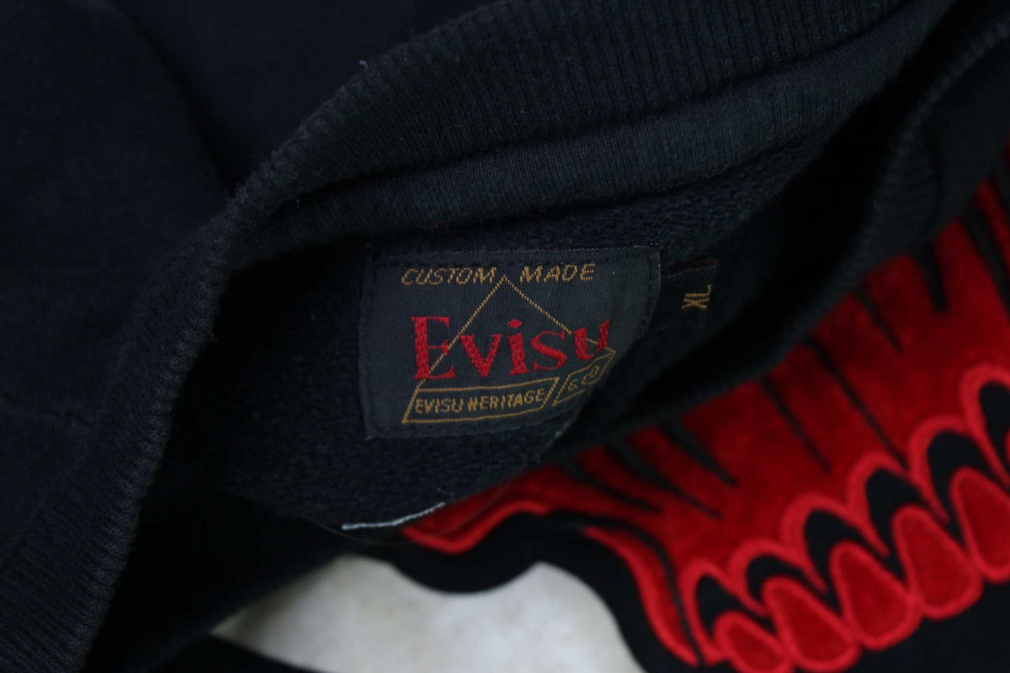 EVISU Crewneck Sweater Black, custom-made tag and design details.