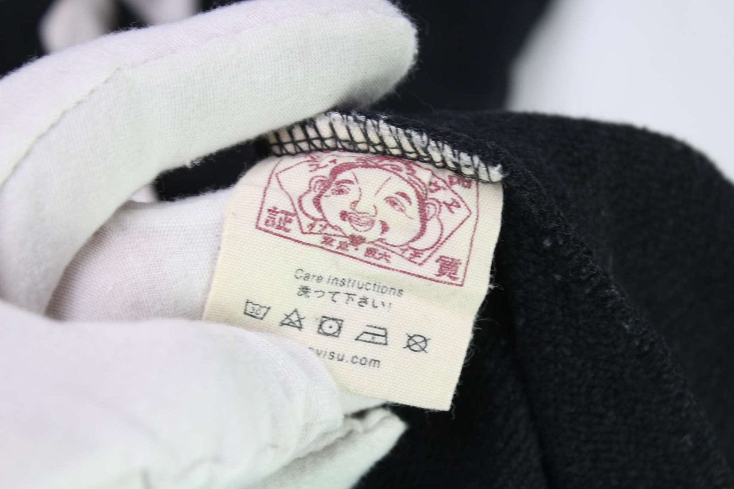 EVISU Crewneck Sweater Black with care label.