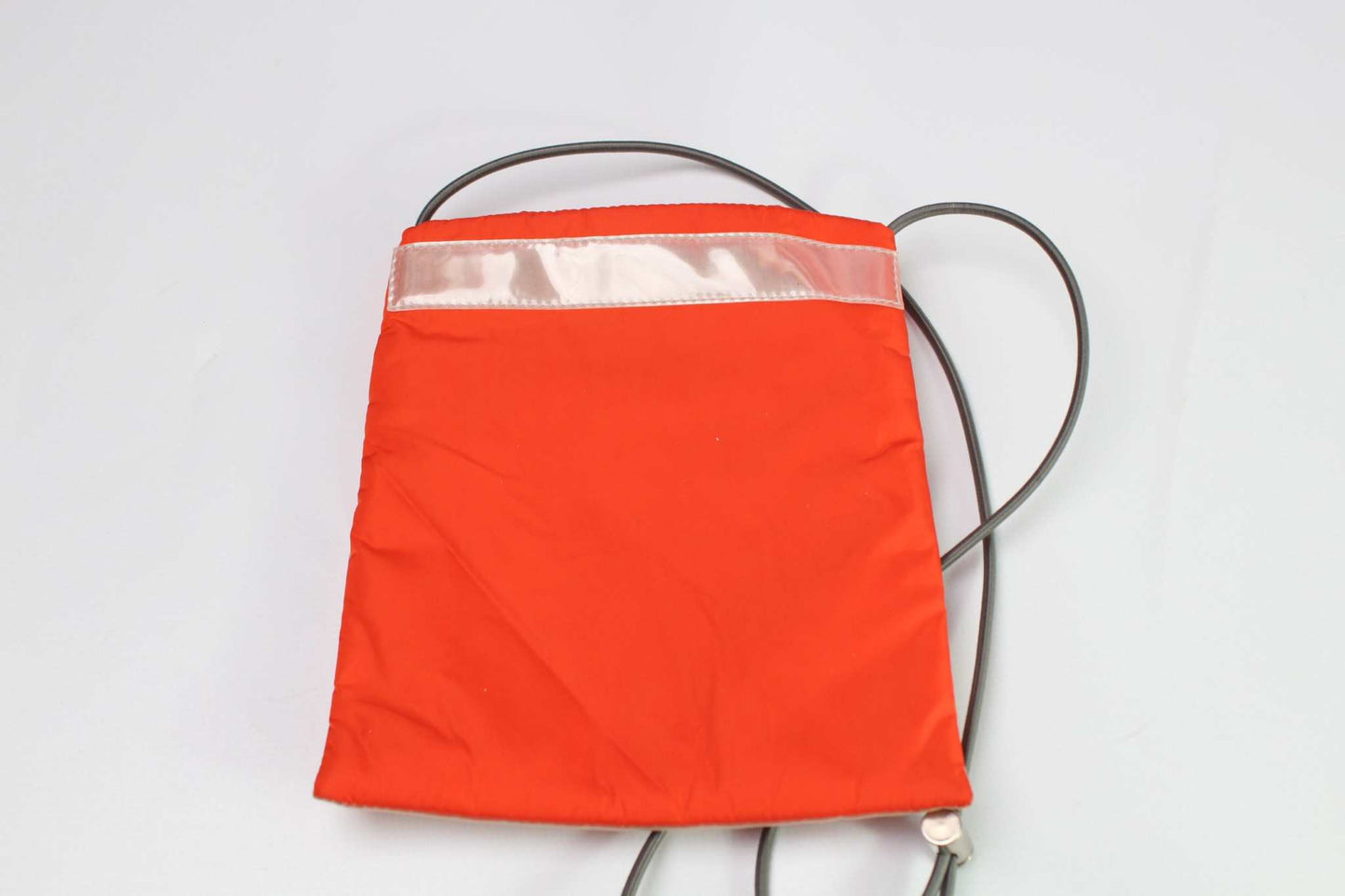 PRADA Sports Slingbag Orange nylon with elastic rubber straps.