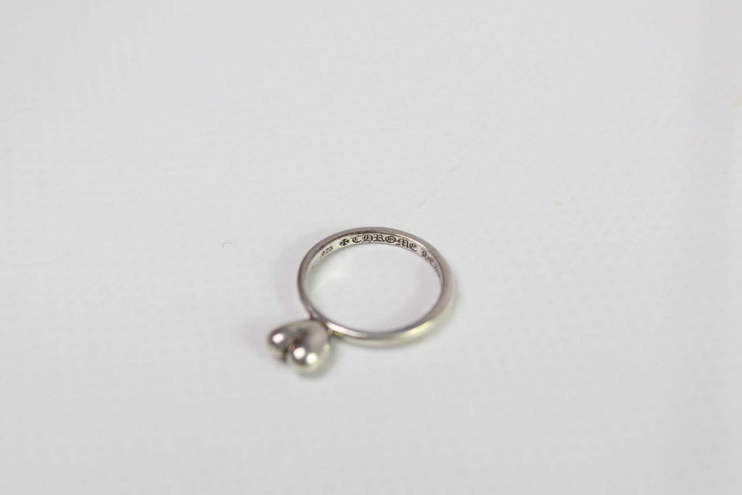 CHROME HEARTS 925S silver heart ring on display.