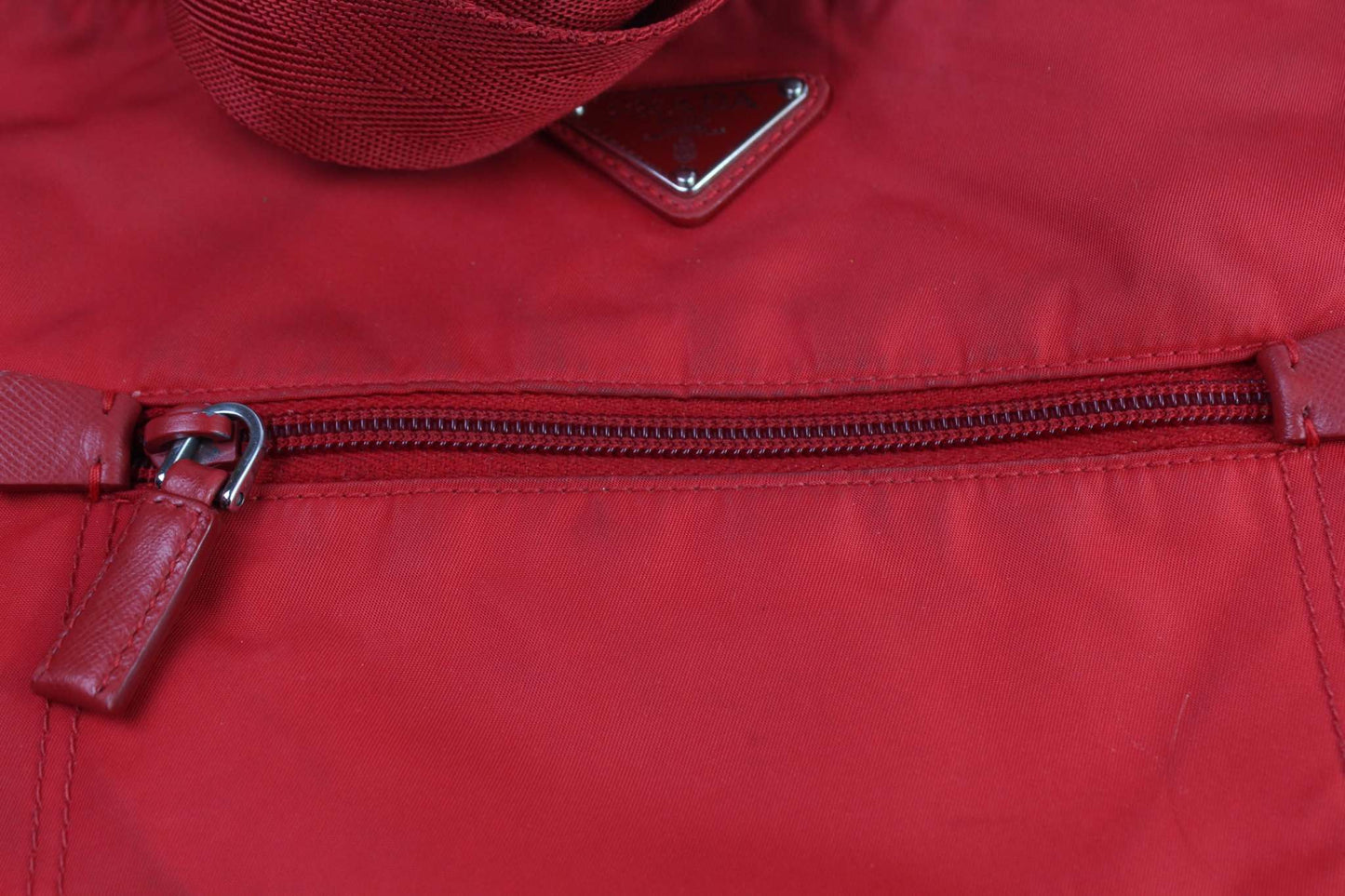 PRADA Slingbag Red with Zipper, nylon material.