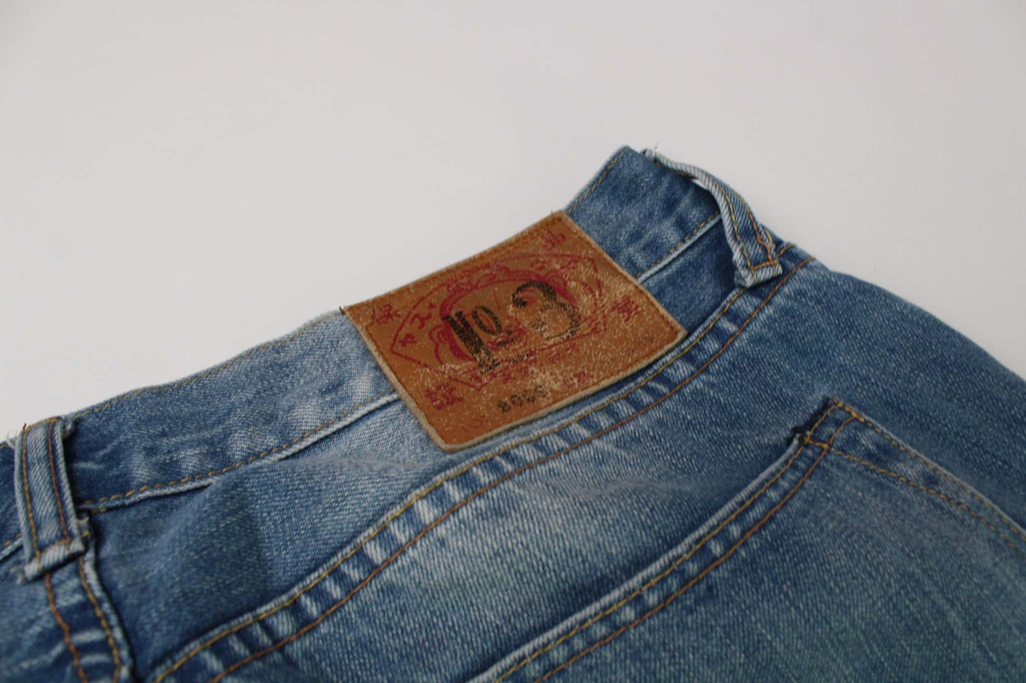 EVISU Rainbow Daicock Denim Pants, baggy fit, dunkelblau, orange & blau, 100% Baumwolle.
