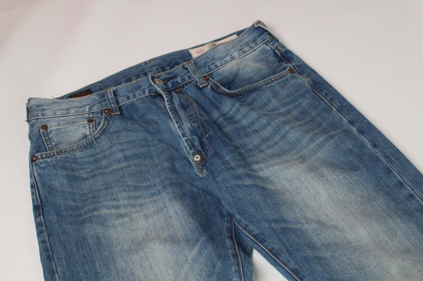 EVISU Rainbow Daicock Denim Pants, baggy fit, dark blue with orange and blue accents, size 34x33, 100% cotton.