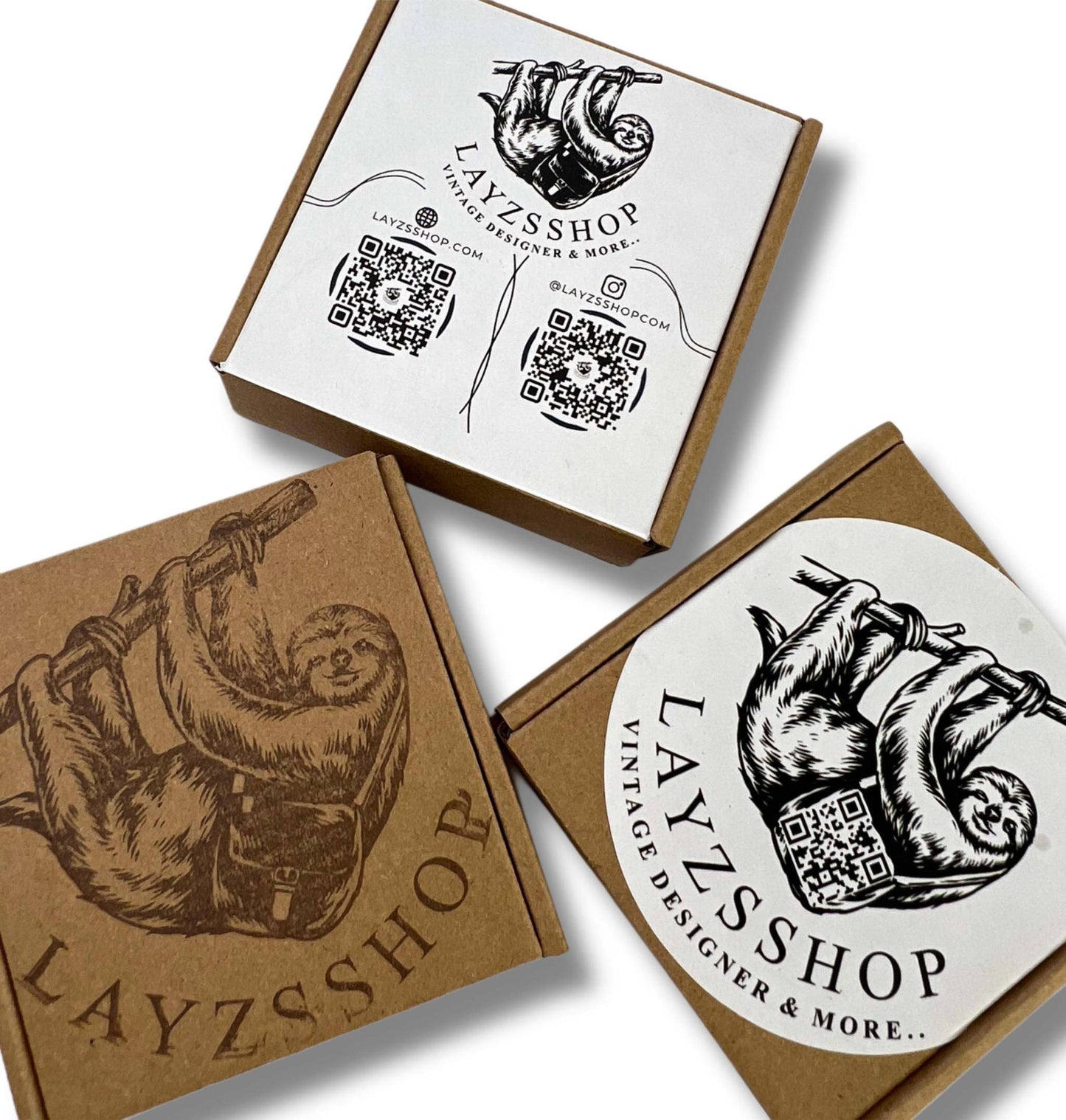 Layzsshop goodie box with sloth design and included goodies like stickers and vintage toys.