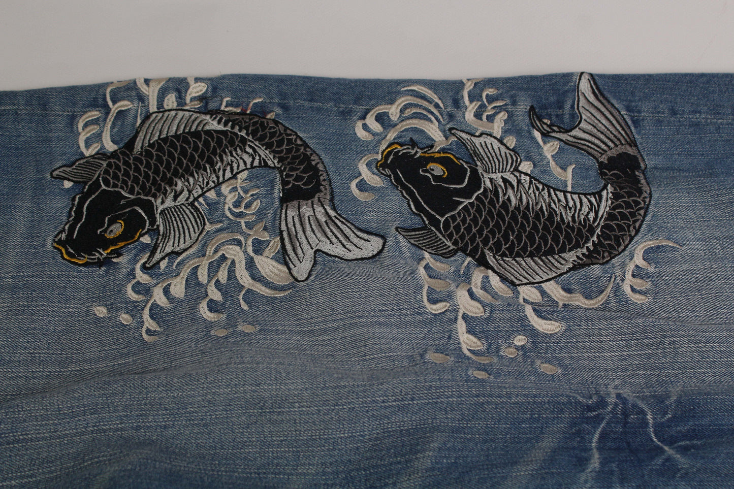Blue Japanese Koi Denim with embroidered koi fish design, size 34, cotton material.