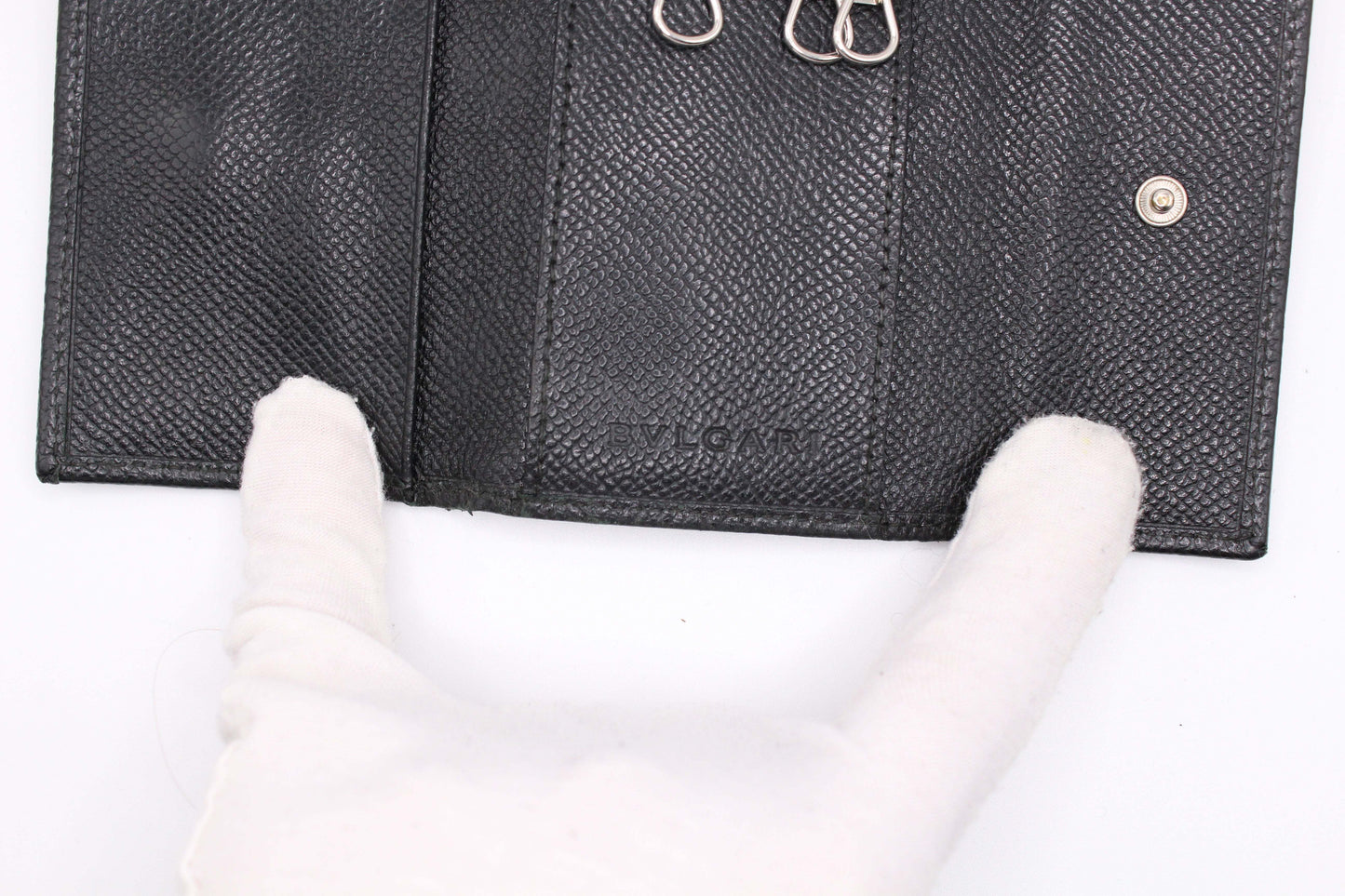 BVLGARI black leather keyholder with hooks, size 5x8cm, condition 8/10.