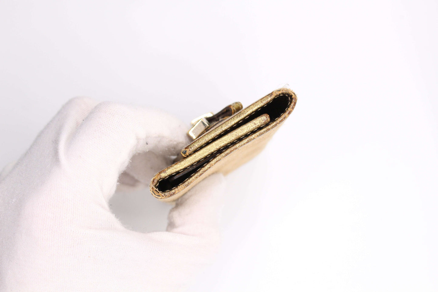 GUCCI Keyholder Monogram Gold in brown and gold canvas leather, size 5x8cm, condition 8/10.