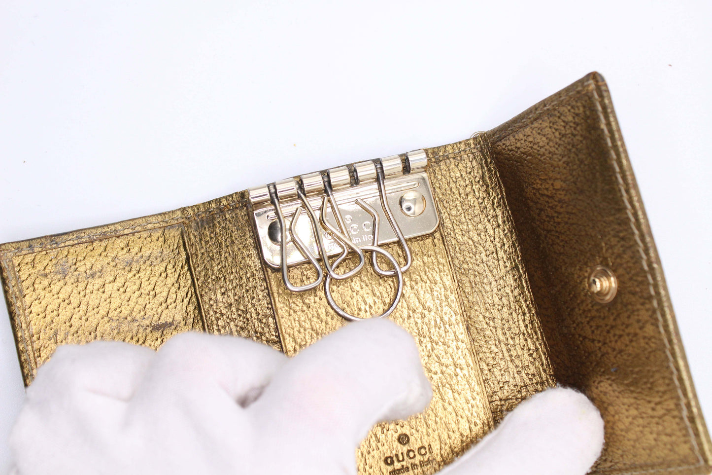 GUCCI Keyholder Monogram Gold in brown and gold canvas and leather.