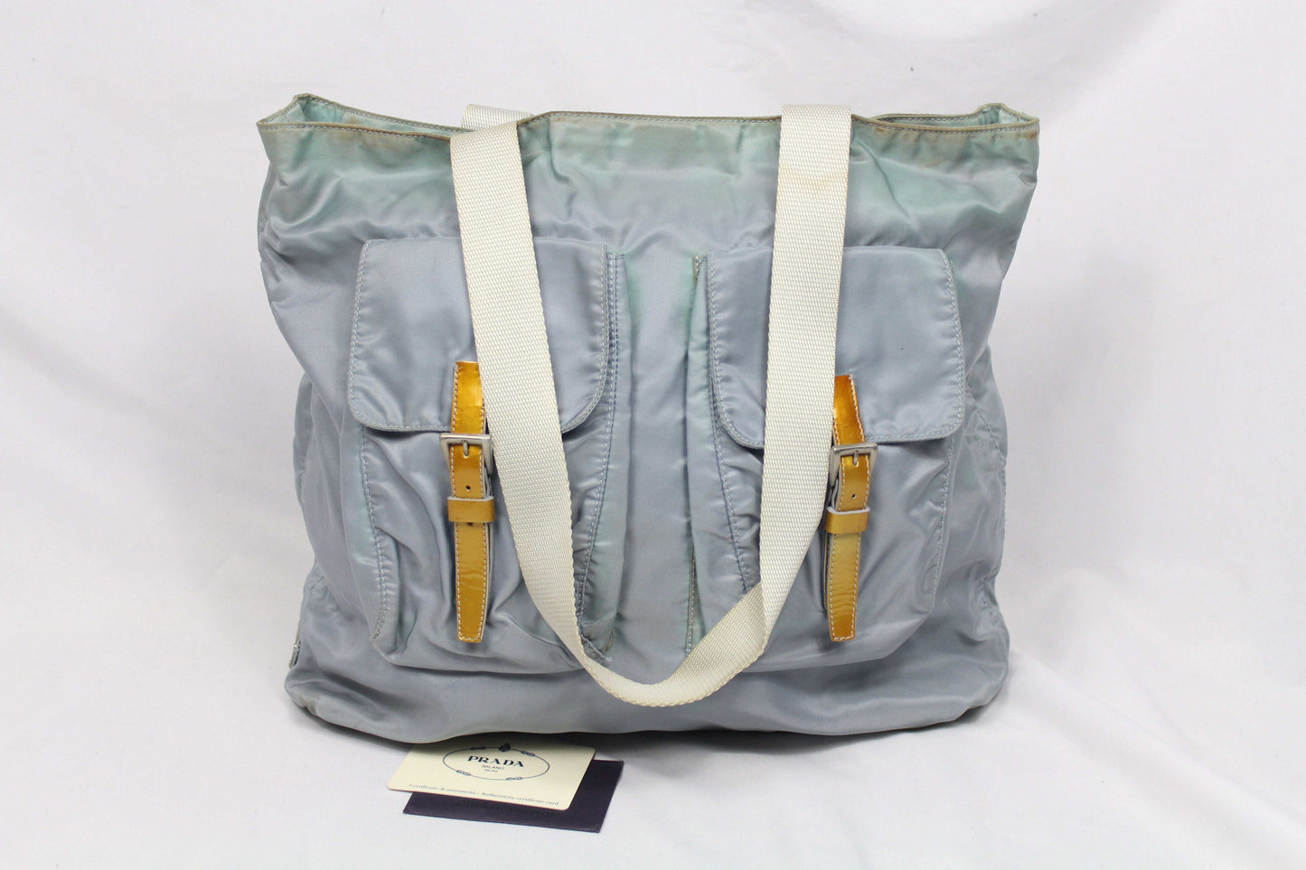Prada Shopper Babyblue nylon bag with side emblem and card shown.