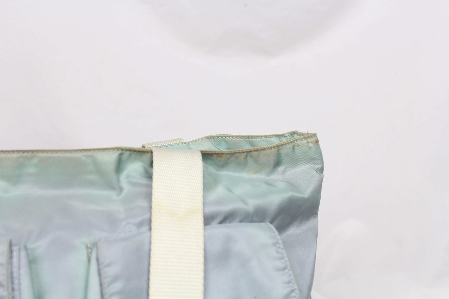 Prada Shopper Babyblue Side Emblem, 45x30 cm, nylon material, baby blue color, visible wear, side emblem detail.