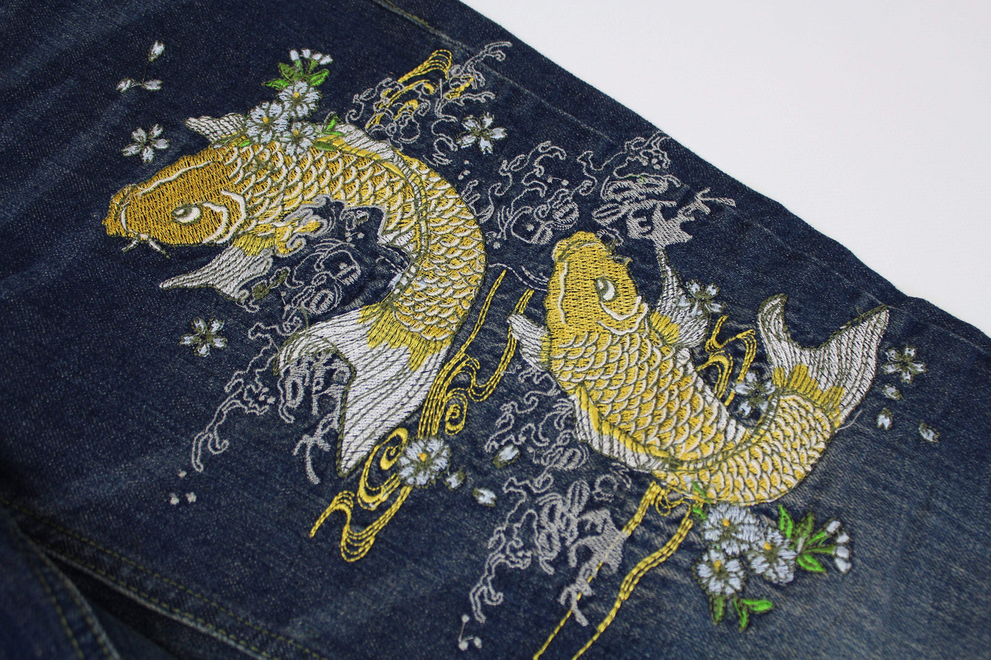 Seku Embroidery Denim featuring koi fish design, slim/straight fit, blue cotton material.