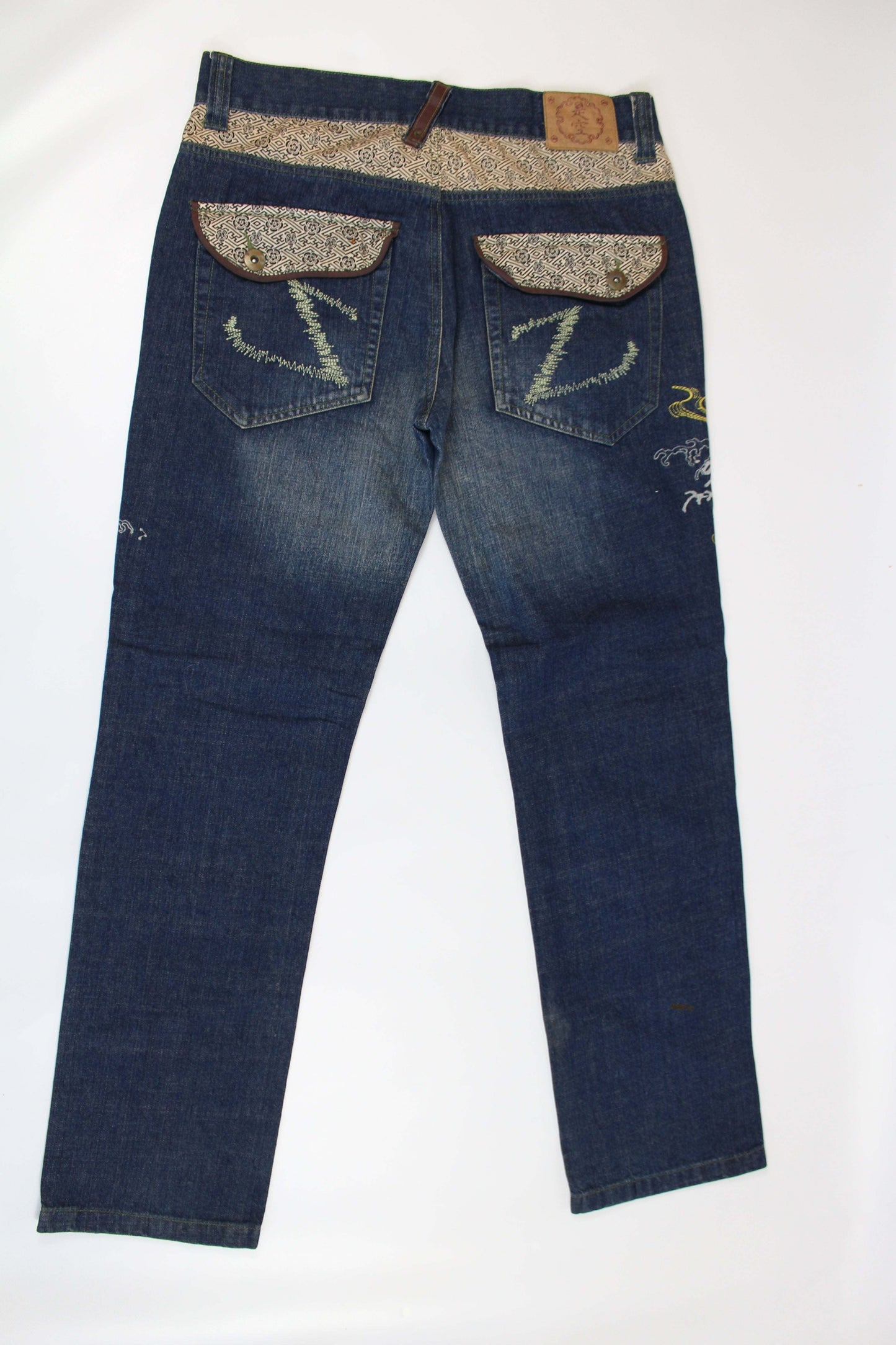 Slim straight Seku embroidery denim jeans in blue, size 33, made from cotton.