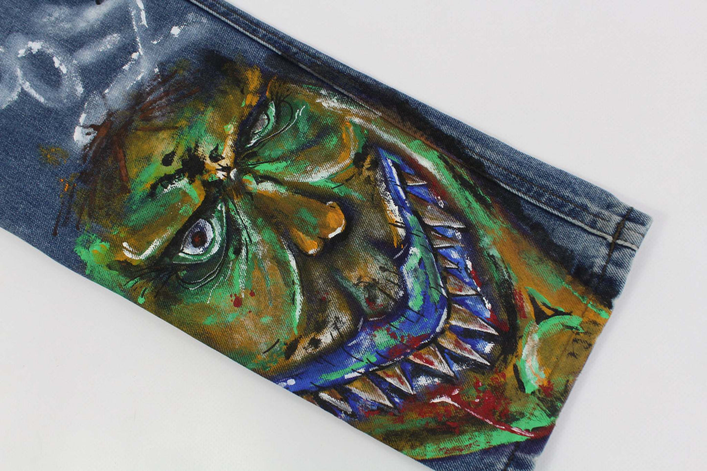 Denim hand painted custom jeans with colorful face design, size 31,34, straight fit, blue color, 100% cotton.
